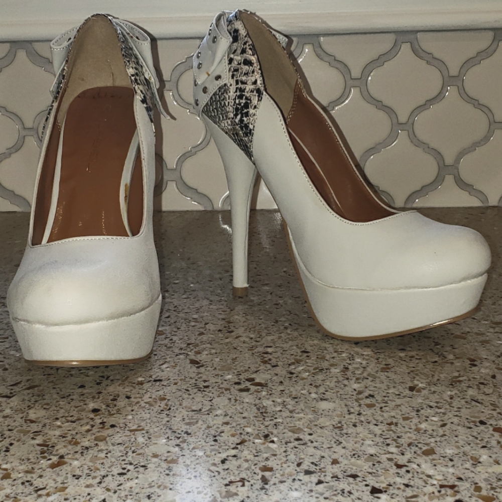 C label studded bow heels
